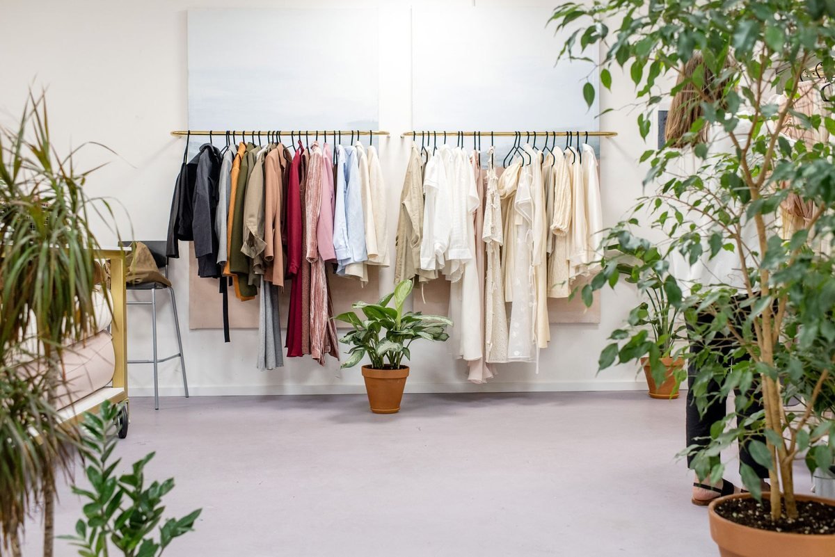 Buying house showroom with garment samples on rails